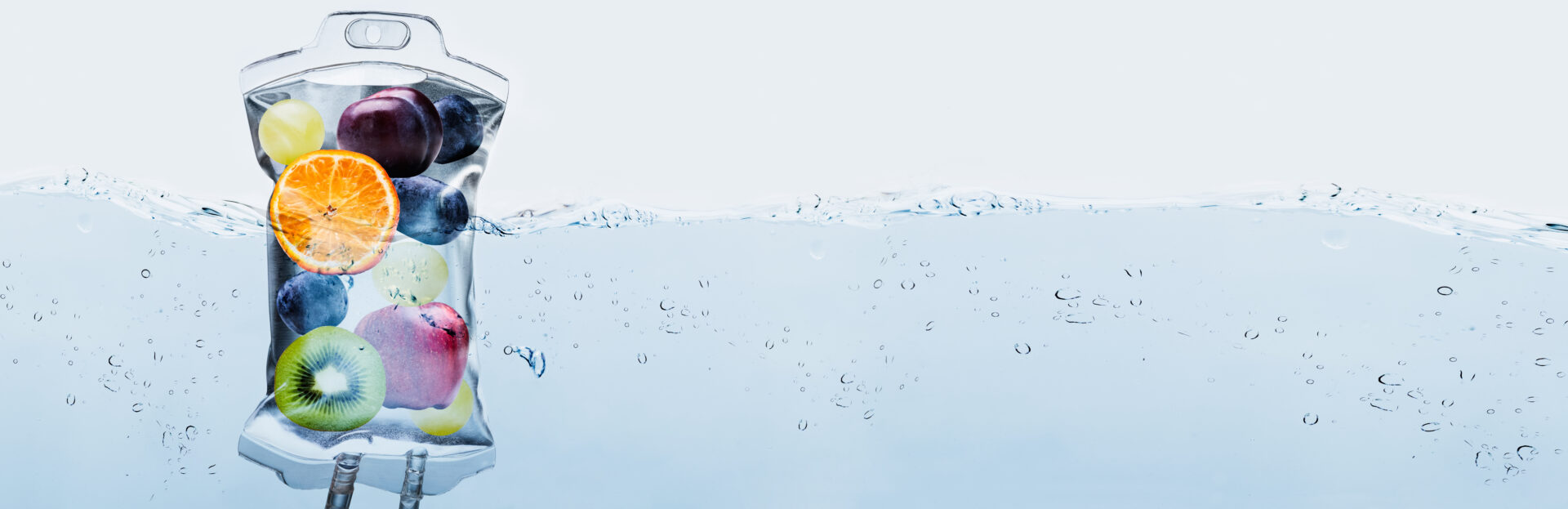 A large group of people flying kites in the snow.